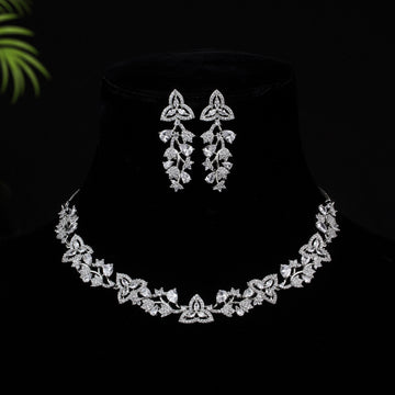 Dhara - Silver Plated Sparkling And Delicate Flower Necklace Set with Drop Earring